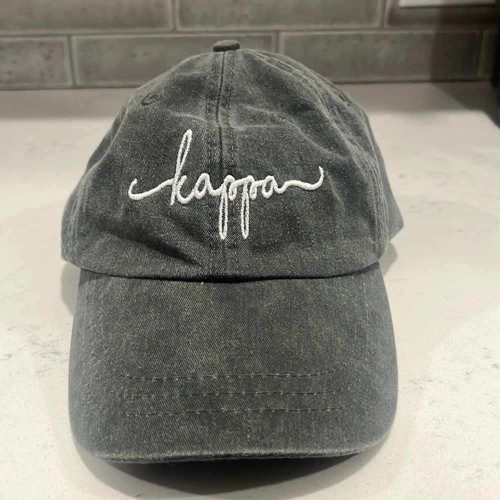 Kappa light grey baseball hat with adjustable back.